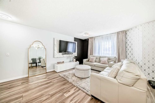 57 Mt Aberdeen Manor Se, Calgary, AB - Indoor Photo Showing Living Room