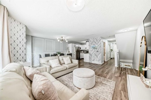57 Mt Aberdeen Manor Se, Calgary, AB - Indoor Photo Showing Living Room