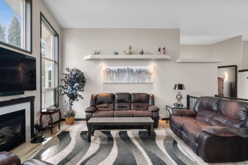 80 Cambrille Crescent, Strathmore, AB - Indoor Photo Showing Living Room With Fireplace