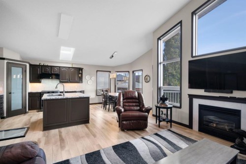 80 Cambrille Crescent, Strathmore, AB - Indoor Photo Showing Living Room With Fireplace