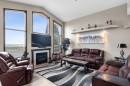 80 Cambrille Crescent, Strathmore, AB  - Indoor Photo Showing Living Room With Fireplace 