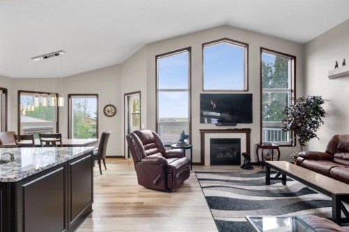 80 Cambrille Crescent, Strathmore, AB - Indoor Photo Showing Living Room With Fireplace