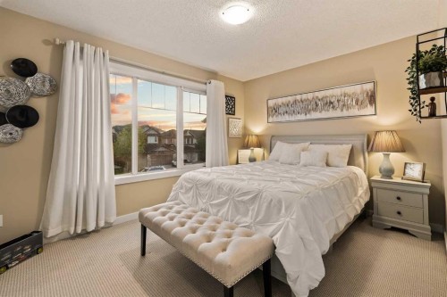 62 Panamount View Nw, Calgary, AB - Indoor Photo Showing Bedroom