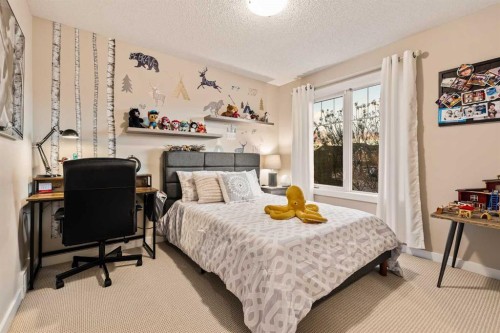 62 Panamount View Nw, Calgary, AB - Indoor Photo Showing Bedroom