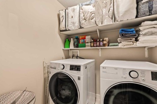 62 Panamount View Nw, Calgary, AB - Indoor Photo Showing Laundry Room