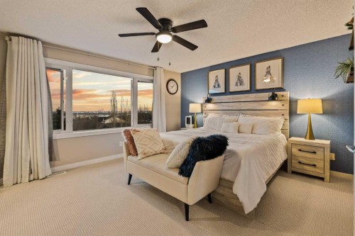 62 Panamount View Nw, Calgary, AB - Indoor Photo Showing Bedroom