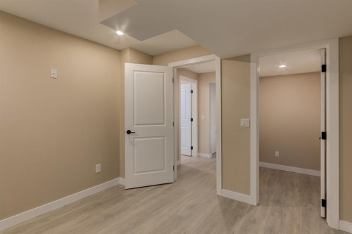 62 Panamount View Nw, Calgary, AB - Indoor Photo Showing Other Room
