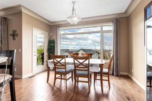 7 Sunset Way, Cochrane, AB - Indoor Photo Showing Dining Room