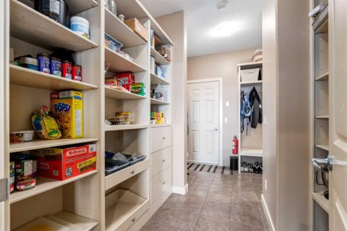 7 Sunset Way, Cochrane, AB - Indoor With Storage