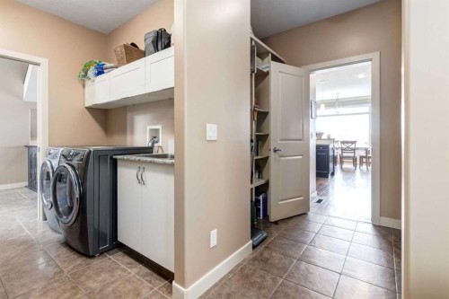 7 Sunset Way, Cochrane, AB - Indoor Photo Showing Laundry Room