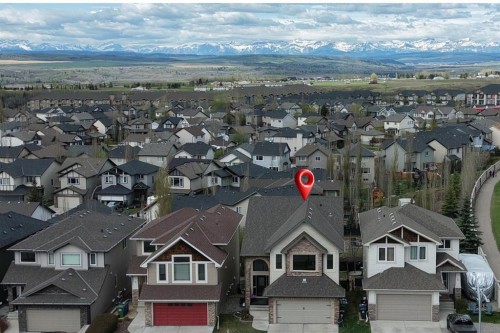 7 Sunset Way, Cochrane, AB - Outdoor With Facade