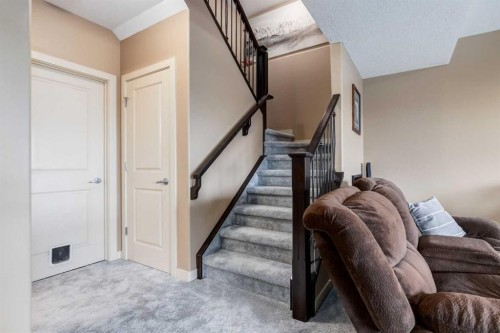 7 Sunset Way, Cochrane, AB - Indoor Photo Showing Other Room