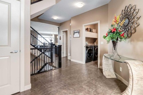 7 Sunset Way, Cochrane, AB - Indoor Photo Showing Other Room