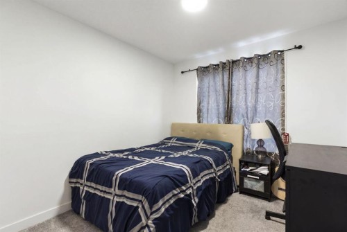60 Belmont Villas Sw, Calgary, AB - Indoor Photo Showing Bedroom