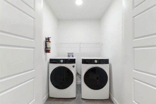 60 Belmont Villas Sw, Calgary, AB - Indoor Photo Showing Laundry Room