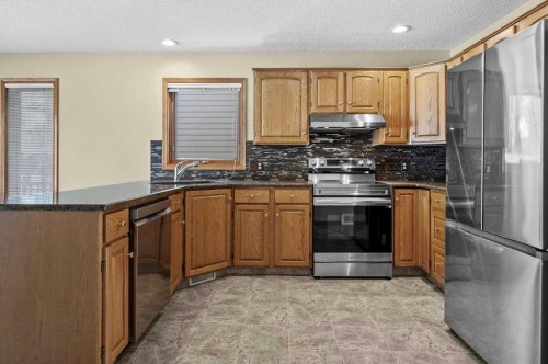 100 Macewan Park Manor Nw, Calgary, AB - Indoor Photo Showing Kitchen With Stainless Steel Kitchen