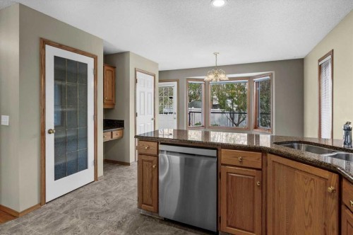100 Macewan Park Manor Nw, Calgary, AB - Indoor Photo Showing Kitchen With Double Sink