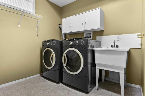 100 Macewan Park Manor Nw, Calgary, AB - Indoor Photo Showing Laundry Room