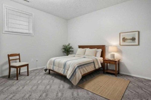 100 Macewan Park Manor Nw, Calgary, AB - Indoor Photo Showing Bedroom