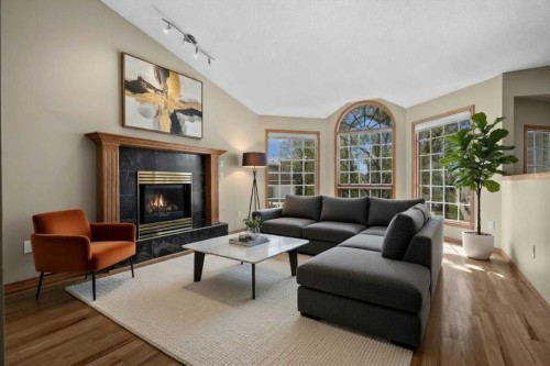 100 Macewan Park Manor Nw, Calgary, AB - Indoor Photo Showing Living Room With Fireplace