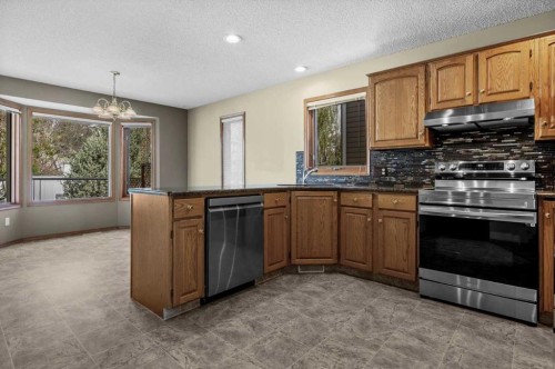 100 Macewan Park Manor Nw, Calgary, AB - Indoor Photo Showing Kitchen With Double Sink