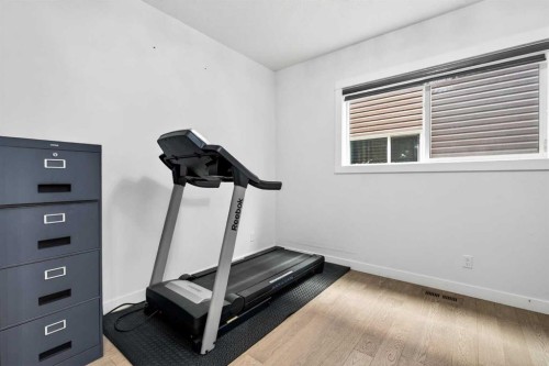 49 Redstone Heath Ne, Calgary, AB - Indoor Photo Showing Gym Room