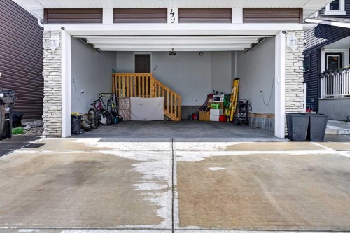 49 Redstone Heath Ne, Calgary, AB - Indoor Photo Showing Garage