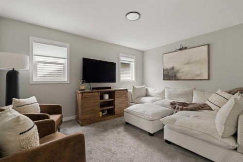 630 Kingsmere Way Se, Airdrie, AB - Indoor Photo Showing Living Room