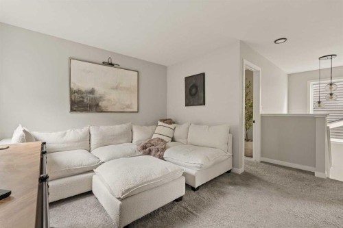 630 Kingsmere Way Se, Airdrie, AB - Indoor Photo Showing Living Room