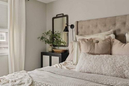 630 Kingsmere Way Se, Airdrie, AB - Indoor Photo Showing Bedroom