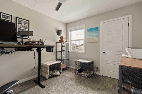 630 Kingsmere Way Se, Airdrie, AB - Indoor Photo Showing Gym Room