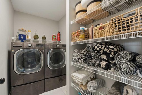 630 Kingsmere Way Se, Airdrie, AB - Indoor Photo Showing Laundry Room