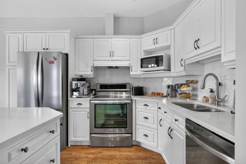 205-2 14 Street Nw, Calgary, AB - Indoor Photo Showing Kitchen With Stainless Steel Kitchen With Double Sink