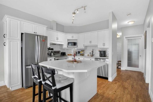 205-2 14 Street Nw, Calgary, AB - Indoor Photo Showing Kitchen With Stainless Steel Kitchen With Upgraded Kitchen
