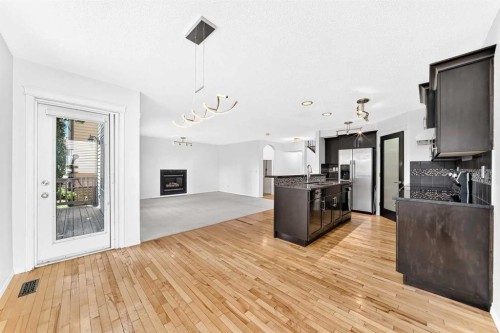 6 Cougarstone Crescent Sw, Calgary, AB - Indoor With Fireplace