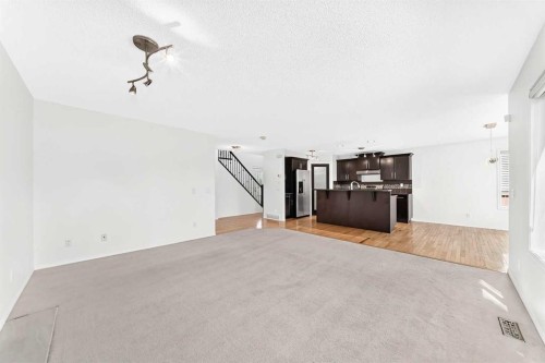6 Cougarstone Crescent Sw, Calgary, AB - Indoor Photo Showing Other Room