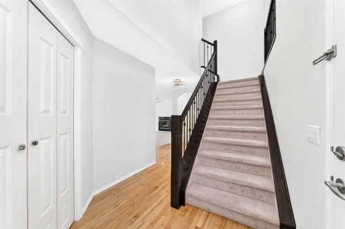 6 Cougarstone Crescent Sw, Calgary, AB - Indoor Photo Showing Other Room