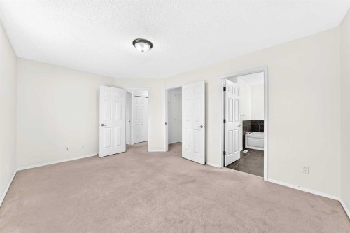 6 Cougarstone Crescent Sw, Calgary, AB - Indoor Photo Showing Other Room