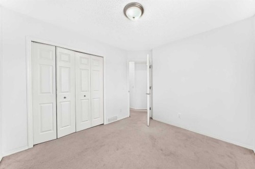 6 Cougarstone Crescent Sw, Calgary, AB - Indoor Photo Showing Other Room