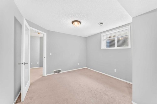 6 Cougarstone Crescent Sw, Calgary, AB - Indoor Photo Showing Other Room
