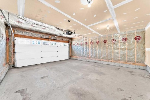 6 Cougarstone Crescent Sw, Calgary, AB - Indoor Photo Showing Garage