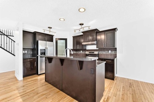 6 Cougarstone Crescent Sw, Calgary, AB - Indoor Photo Showing Kitchen With Upgraded Kitchen