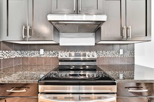 6 Cougarstone Crescent Sw, Calgary, AB - Indoor Photo Showing Kitchen With Upgraded Kitchen