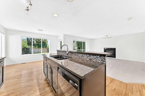 6 Cougarstone Crescent Sw, Calgary, AB - Indoor Photo Showing Kitchen With Double Sink