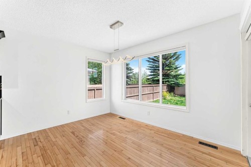 6 Cougarstone Crescent Sw, Calgary, AB - Indoor Photo Showing Other Room