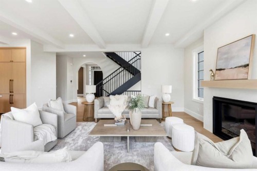 703 35 Street Nw, Calgary, AB - Indoor Photo Showing Living Room With Fireplace