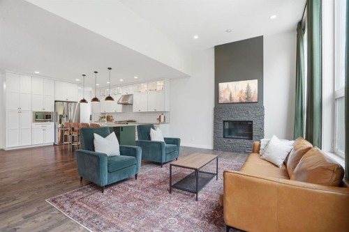 37 Walden Park Se, Calgary, AB - Indoor Photo Showing Living Room With Fireplace