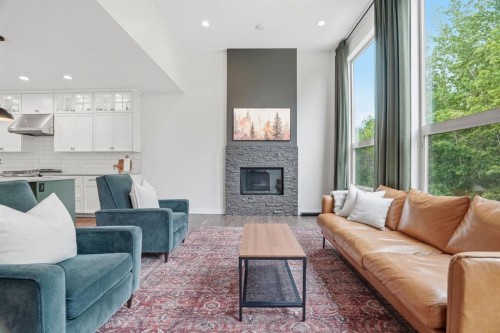 37 Walden Park Se, Calgary, AB - Indoor Photo Showing Living Room With Fireplace