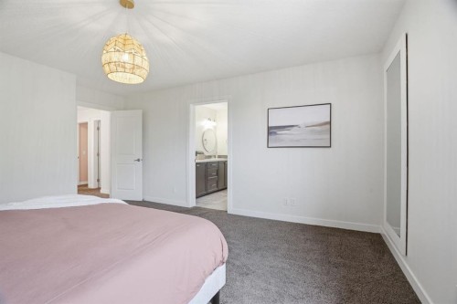 37 Walden Park Se, Calgary, AB - Indoor Photo Showing Bedroom
