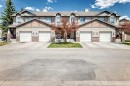 65 Spring Meadows Bay, Okotoks, AB  - Outdoor With Facade 